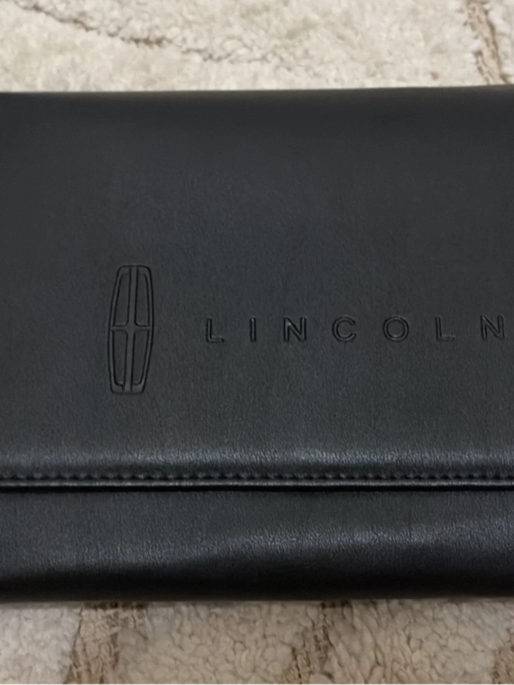 Black leather owners manual holder